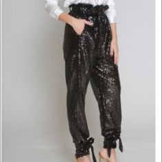 High Waisted Sequin Pants With Ankle Tie Glamorous High-waist Pants For Workwear, Sequin Pants For Night Out In Fall, Glamorous High Waist Bottoms For Going Out, Glamorous Trousers For Going Out, Straight Party Pants With Belt Loops, Party Straight Pants With Belt Loops, Glamorous Stretch Pants For Work, High Waist Bottoms For Fall Party, Glamorous Straight Pants For Workwear