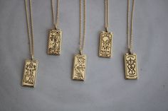 Gold plated Tarot Card charms on a 18k gold plated chain. *Available lengths: 16, 18, 20 inches Mystical Engraved Gold Jewelry, Mystical Engraved Gold Necklace, Mystical Gold Engraved Necklace, Magical Gold Nickel-free Jewelry, Mystical Gold Charm Necklace Gift, Tarot Card Necklace, Heart Moon, Card Necklace, Christmas Gift For Her