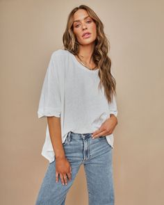 Oversized Fit 70% Cotton and 30% Polyester Hand Wash Cold. Hang Dry Wide Neckline Dolman Sleeves No Closures Not Linedâ€?Semi Sheer Every closet Effortless Crew Neck Top For Day Out, Relaxed Cotton Tops With Loose Fit, Spring Cotton Tops With Loose Fit, Loose Fit Cotton Top For Spring, Effortless Oversized Top For Layering, White Long Sleeve Effortless Top, Effortless White Long Sleeve Top, Relaxed Fit Tops For Layering, Relaxed Oversized Tops For Day Out