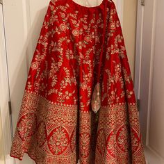 Brand New Wedding Lehenga With Two Dupattas Never Worn! Red Wedding Choli With Tilla Detailing, Red Tilla Choli For Wedding, Red Choli With Tilla For Wedding, Red Traditional Wear With Tilla For Wedding, Red Lehenga With Pallu For Wedding, Red Traditional Wear With Intricate Embroidery For Wedding, Red Embroidered Wedding Dupatta, Traditional Red Lehenga For Ceremony, Red Traditional Lehenga For Ceremony