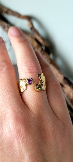 Amethyst & Peridot Gold Faerie Tale Ring | Caroline Stokesberry-Lee Jewellery Design Peridot Gold Jewelry, Special Rings Design, Amethyst And Peridot Ring, Gold Multi-stone Jewelry For May Birthstone, Yellow Gold Sapphire Open Ring In Unique Style, Yellow Gold Sapphire Ring With Open Ring Style, Gold Round Gemstones For Anniversary, Fine Jewelry Amethyst Gold Ring, Modern Gold Amethyst Gemstone Ring