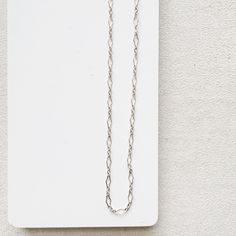 A customer favorite! You will instantly fall in love with the Halo Necklace. The beautiful pattern stands out from all of the other chains. It has a feminine, airy feel. Whether you layer it with other necklaces, let it shine on its own, or add a gemstone or pearl Bijou Charm, The Halo elevates any look. - 16-18 inches & super versatile. 18 inches is a true classic length or wear it closer to 16 inches for a shorter style, sitting closer to the base of the neck. - all pieces are 14K Gold filled Delicate Sterling Silver Chain Necklace For Everyday, Delicate Sterling Silver Chain Necklace For Layering, Sterling Silver Necklaces With Delicate Chain Link, Dainty White Gold Necklace For Layering, Delicate White Gold Cable Chain Necklace, Sterling Silver Long Chain Necklace, Dainty Link Necklace With Silver Chain, Dainty Sterling Silver Chain Necklace For Layering, Everyday Long Silver Chain Necklace