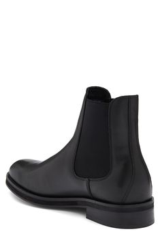 A plain-toe Chelsea boot constructed from smooth leather features dual inset elastic gores for easy-wear comfort. Leather and textile upper/leather lining and sole Made in Italy Black Leather Chelsea Boots With Leather Lining, Black Leather Chelsea Boots With Leather Footbed, Leather Slip-on Chelsea Boots With Rubber Heel Cap, Leather Chelsea Boots For Business In Fall, Fall Leather Chelsea Boots For Business, Black Leather High-top Chelsea Boots, Black High-top Leather Chelsea Boots, Fall Business Leather Chelsea Boots, Fall Business Chelsea Boots In Leather