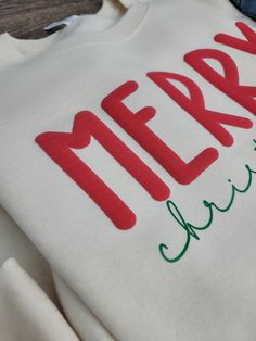 Step into the holidays with this adorable Merry Christmas Puff Graphic Sweatshirt. 🎄These are custom made to order. Please allow up to 10 business days to make and ship your item. 🎄 YOU MUST WASH THIS GARMENT INSIDE OUT WITH COLD WATER ON DELICATE ONLY HANG DRY ONLY If you do not follow the proper care instructions the letters WILL fall off. We are not responsible for damaged items not following the proper care instructions. Diy Sweaters Vinyl, Puff Letter Sweatshirt, Diy Christmas Sweater Cricut, Merry Christmas Sweatshirts, Cute White Christmas Sweatshirt, Christmas Sweater Cricut, Diy Christmas Sweatshirts, Cricut Sweatshirt Ideas, Christmas Sweatshirt Ideas