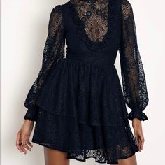 You Could Live Forever You Just Have To Pay The Price. This Intricate Black Lace Evokes A Feeling Of Bygone Eras, As Though It Could Have Been In Your Closet For Hundreds Of Years. Made From A Structured Lace Fabric Whimsical Gathered Full-Length Sleeves Ruffle Front Detail Flirty Tiered Skirt Partly Lined Bodice, Fully Lined Skirt Nwt Only Ever Tried On. Au Size 8 Fitted Dresses With Lace Patchwork For Date Night, Fitted Lace Patchwork Dress For Date Night, Elegant Mini Dress With Lace Patchwork, Lace Mini Dress For Evening Occasions, Mini Dress With Lace Sleeves For Date Night, Black Lace Patchwork Dress For Date Night, Mini Length Lace Patchwork Dress For Date Night, Cocktail Mini Dress With Lace Patchwork, Mini Lace Patchwork Dress For Date Night