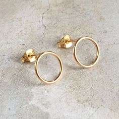 10mm cicle stud earrings - goldfilled stud earrings - minimalist ear studs - geometric studsA jewellery box staple, these minimalist cicrle studs will never go out of fashion.  Perfect for everyday wear, for a grandchild, teenage daughter, God daughter or young bridesmaid.You can choose the finish of these earrings so they can be exactly how you would like them - hammered, mirror polish, or satin matte.Circle dimensions are approximately 10mm, post length is approximately 10mm.  If you would pre Circle Stud Earrings, Minimalist Round Disc Earrings, Minimalist 14k Gold Filled Circle Earrings, Small Circle Stud Earrings, Minimalist Earrings Studs, Geometric Studs, Minimalist Studs, Circle Earrings Studs, Moonstone Bracelet