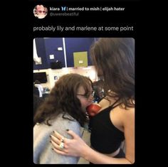 a woman is hugging another woman in an office cubicle and the caption reads, probably i'm married to mish