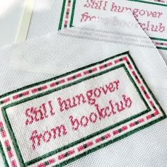 three cross stitch samples with the words still hung over from scotland on them, sitting next to each other