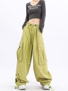 Elevate your casual look with our Oversized Baggy Cargo Pants. Featuring a trendy Y2K influence, these streetwear essentials by Acubi offer a relaxed fit, drawstring waist, and functional pockets for a fashionable and comfortable outfit. Acubi Aesthetic, Baggy Track Pants, Parachute Cargo Pants, Parachute Cargo, Wide Leg Cargo Pants, Comfortable Outfit, Camo Jeans, Streetwear Essentials, Baggy Cargo Pants