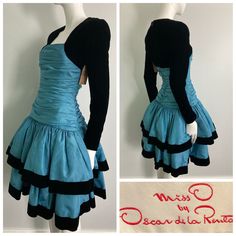 "Beautiful 1980s Miss O by Oscar de la Renta dress. Gorgeous blue taffeta with tule layered under each tier, black velvet sleeves and trim on skirt. This label is a step down from couture, and is constructed beautifully. Center back zipper closure, gathered bodice, this dress is quite heavy and full. There are a few faint small water marks on the skirt that are not very noticeable but mentionable. as this item has not yet been cleaned and  we have priced it accordingly. It's an absolutely stunning dress and really shows it quality and design Bust: 32\" Waist: 26\" Hip: 32-34\" Sleeve: 23.25\" Length: 39.25\" If you have any questions or would like more information about this listing, please don't hesitate to ask." 1980s Dresses Casual, Blue Dress Styling, Layerd Dress, Dress Upcycling, 80s Formal Dress, Perfect Blue Dress, Dynamic Clothes, 2000 Dresses, Blue Dress With Sleeves