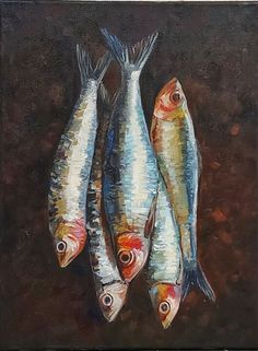 three fish are shown on a brown background