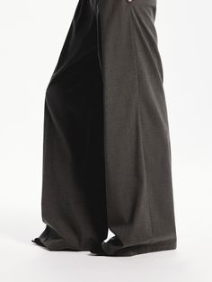 MO&Co. Women's Pleated Wide Leg Pants Crafted from well-done fabric, these wide-leg pants have been designed to fall loosely over the body. With convenient side slip pockets and a front pleated design that creates a flattering silhouette. Features : - Relaxed wide-leg silhouette- Side slip pockets, back welt pockets- Front pleated design Code: MBD3PATT03The back length of size M is 108cmMATERIALS & CARE Material: 66.8% Polyester 30.9% Viscose 2.3% SpandexPlease put it into a mesh bag to wash.REM Baggy Formal Pants For Fall, Full Length Culottes For Work, Classic Baggy Wide-leg Pants, Baggy Wide-leg Dress Pants For Workwear, Baggy High-waisted Wide Leg Pants For Formal Occasions, Formal High-waisted Baggy Wide Leg Pants, Formal Baggy High-waisted Wide Leg Pants, Classic Baggy Full Length Wide Leg Pants, Formal Baggy Wide-leg Pants