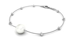 Product Details The Freshwater Pearl Chain Bracelet is a stunning piece of jewelry that exudes elegance and grace. Featuring a beautiful freshwater pearl as the centerpiece of the design, this bracelet is perfect for adding a touch of sophistication to any outfit. The delicate gold chain is complemented by a series of intricately crafted beaded accents that give the bracelet a unique and stylish look. The bracelet is handcrafted from high-quality materials and is designed to last, making it the perfect gift for a loved one or a well-deserved treat for yourself. Whether worn on its own or paired with other accessories, this bracelet is sure to become a cherished part of your jewelry collection. Product Information SKU SHP-BRACELET022210426 Weight 2.40 gm (Approximate) FRESHWATER PEARL INFOR Delicate Gold Chain, Yellow Gold Bracelet, Pearl Chain, June Birth Stone, Chain Bracelet, Gold Chain, Gold Chains, A Series, Fresh Water