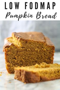 a loaf of low fodmap pumpkin bread on a white surface with text overlay