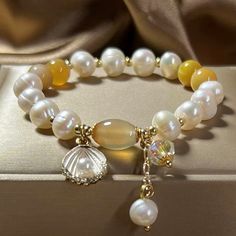 Add a touch of luxury to your look with this beautifully crafted bracelet. Designed to withstand the test of time and elevate any look. Natural fritillary, Agate, freshwater pearls Amber size: 8 mm Premium zinc alloy Elastic - Suitable for hand circumference: 14-18 CM Hypoallergenic, lead & nickel free *We carefully select each gemstone to offer gems with the best quality. As gemstones are natural materials, stone colors may vary slightly from the images, making this beautiful bracelet completely unique, just like you!If you aren't in LOVE with your purchase, please let us know within 30 days of receiving your item, and you'll receive a stress-free refund. Best Friend Birthday Party, Friend Birthday Party, Freshwater Pearl Bracelet, Adjustable Bangle, Agate Bracelet, Natural Pearl, Best Friend Birthday, Agate Crystal, Lovely Jewellery