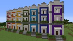 a row of multicolored houses in minecraft