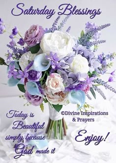 a bouquet of flowers sitting on top of a white table next to the words, saturday blessings today is divine inspiration simply because god made it