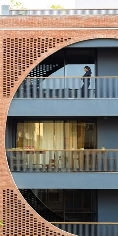 an apartment building with balconies and balcony railings