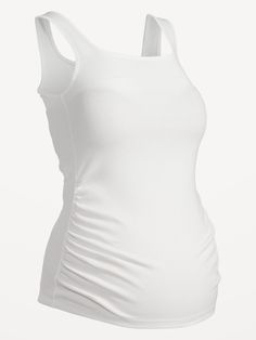 square neckline sleeveless shirred sides for a flexible fit fitted through body hits below belly model is approximately 5'9" and wears a size M (8)Machine wash cold, tumble dry low.  spandex 5% polyester 38% cotton 57% Fitted Ruched Top With Square Neck, Stretch Tank Top With Ruched Back For Summer, Summer Stretch Tank Top With Ruched Back, Fitted Ruched Scoop Neck Top, Ruched Elastane Tank Top, Fitted Sleeveless Tank Top With Ruched Back, Sleeveless Stretch Tops With Ruched Back, Fitted Top With Ruched Sides, Fitted Tops With Ruched Sides