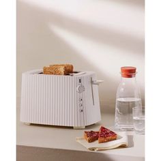 Alessi Plissé Toaster & Reviews | Wayfair Citrus Squeezer, Appliances Design, Candle Stick Holders, Toasters, Tableware Design, Exclusive Furniture, Crystal Glassware, Hand Blender, Cutlery Sets