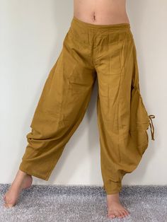 "Cotton Soft Rope Pants, Lady Pants, Light Weight Women Pants If you are looking for some pants that you can wear everywhere, comfortable, relax and Easy to wear. Cotton Soft Pants is Answer!! Nice gift for yourself or your lover Approx. Measurements: Waist 40\" Length 37\" Hip 48\" Inseam 28\" Ankle 12\" FRONT RISE: Measure from the center of the crotch to the top of the waist = 11\" - Condition: Brand new without tags. 100% Cotton - Made in Thailand Shipping & Handling * Parcels will be sh Comfortable Solid Color Ankle-length Harem Pants, Casual Harem Yoga Pants With Pockets, Yoga Trousers With Pockets, Solid Tapered Leg Yoga Pants, Loose Fit Yoga Pants With Tapered Leg, Brown Harem Pants With Pockets, Wide-leg Harem Pants With Pockets For Yoga, Yoga Harem Pants With Pockets, Cotton Yoga Pants With Tapered Leg