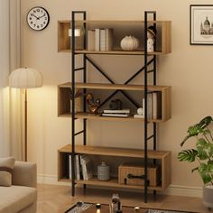 a living room with a couch, coffee table and bookshelf in the corner