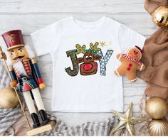 "Personalized Christmas Kids Shirt -Christmas Reindeer Shirt-Kids Christmas Joy Shirt-Toddler Shirt-Youth Shirt-Crew Neck Pullover Shirt. HOW TO ORDER: *    Select size & sleeve length  *    For personalized designs - enter your customization in the \"Add your personalization\" box.  *    ADD TO CART and proceed to checkout *    Type additional order information in the \"Note to seller\" Box. CARE  *    Wash inside out w/cold water  *    Low heat tumble dry. PRODUCTION TIME: This item made to order and can take 1 to 2 business days before shipping. We do not carry pre-printed shirts. All shirts are printed to order, so we are unable to accept returns or exchanges. Make sure you check our size chart above in the picture carousel. Also, print colors may very slightly from the picture seen on T Shirt Design 2023, T Shirt Design Vintage, Construction Birthday Shirt, T Shirt Design Svg, Toddler Christmas Shirt, Personalized Christmas Shirts, Toddler Halloween Shirts, Vintage Christmas Shirt, Reindeer Shirt