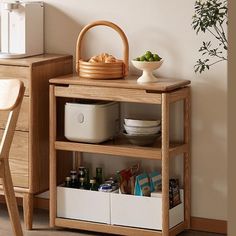 a small wooden table with two baskets on top and some food in the bottom shelf