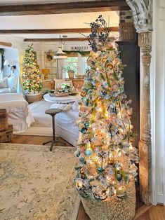 a decorated christmas tree in a living room