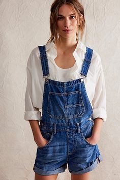 A shortened version of our favorite Ziggy Overalls! **Fit:** Relaxed, bib-and-brace silhouette **Features:** Front bib pocket, rolled hemlines, adjustable straps, side button closures, five-pocket design, frayed cuffs **Why We | We The Free Ziggy Shortalls at Free People in Medium Wash, Size: XL Ziggy Shortalls, Ziggy Overalls, Pregnancy Workout Plan, Free People Overalls, Small Hips, Red Overalls, Free People Jumpsuit, Free People Romper, Overalls Shorts