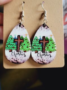 Beautiful Christmas Cross Earrings. These double sided, dangle earrings are lightweight, made out of MDF board and sublimation ink. Matching shirt also available! Sublimation Cross Earrings, Mdf Board, Cross Earrings, Sublimation Ink, Christmas Cross, Beautiful Christmas, Jewelry Earrings Dangle, Etsy Earrings, Dangle Drop Earrings