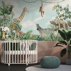 a baby's room with a zebra and giraffe mural on the wall