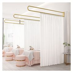 a dining room with white curtains and pink chairs