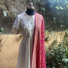 Hand embroidered Anarkali with banarasi bandhej dupatta / anarkali suit set / anarkali dupatta USA / khaddi georgette dupatta / Indian dresses/ voggish / cream anarkali dress          Looking for a perfect indian dress/anarkali/suit sets that are trendy, unique and easy to carry !! yess, You are at the right place. we carry such versatile pieces of anarkalis and suit sets that really let you stand out in any occassion !!      featuring this beautiful pure chanderi dress in cream color with hand Cream Anarkali, Indian Dresses Anarkali, Handloom Dupatta, Chanderi Dress, Bandhej Dupatta, Dress Anarkali, Silk Anarkali, Embroidered Anarkali, Georgette Dupatta