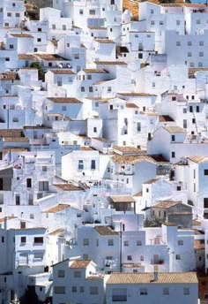 many white buildings are stacked on top of each other