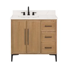 a bathroom vanity with two drawers and a white counter top on the left, and a black faucet on the right