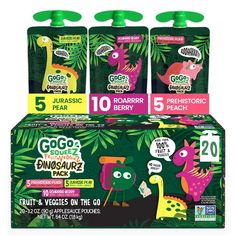 three boxes of gogo organic baby food with dinosaurs on the front and green leaves in the back