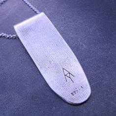 Pendant is crafted in .999 Fine Silver using Metal Clay. The Ogham is hand carved and can per personalized with up to 5 letters. (If you require more than 5 letters please contact me for a price as it does require more silver.) Ogham is an ancient alphabet used during early medieval times, in what is now the UK, for marking territories on trees and stones, read from bottom to top. Ogham only consists of 19 letters (No J, K, P, V, W, X, or Y) but substitutions can be made because the Ogham langua Personalized Engraved Pendant Necklace, Engraved Rectangular Sterling Silver Jewelry, Rectangular Pendant Jewelry With Engraving Option, Rectangular Pendant Jewelry With Engraving Option For Gifts, Engraved Rectangular Pendant Jewelry Gift, Personalized Pendant Jewelry, Gift Jewelry With Engraving Option: Rectangular Pendant, Personalized Amulet Jewelry For Collectors, Personalized Pendant Jewelry Collectible