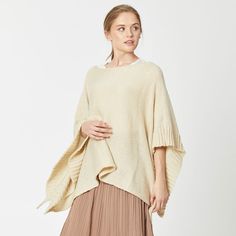 Size : 48.4" X 21.6" Material : 100% Acrylic Winter Poncho In One Size, One Size Winter Poncho In Solid Color, One Size Winter Poncho, One Size Cream Knit Outerwear, One Size Knitted Solid Color Sweater, One Size Solid Knitted Sweater, Wool Poncho Cape One Size, Knit Shawl For Fall, Cozy Shawl Poncho For Spring