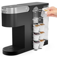 a person is filling their cup with ice cream and coffee from a dispenser