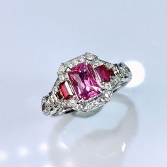 At our establishment, we take pride in guaranteeing the authenticity of every gemstone. Each piece of jewelry features natural stones sourced from the world's most renowned regions. Our rubies are procured from Mozambique and Sri Lanka, while our sapphires are exclusively from Sri Lanka. Our emeralds are sourced from Zambia and Colombia, with tourmalines and amethysts originating from Brazil. Additionally, our opals are from Australia and Ethiopia. Rest assured, all our gold is of the highest ca Pink Sapphire Emerald Cut Ring For Anniversary, Emerald Cut Pink Sapphire Ring For Anniversary, Gia Certified Emerald Cut Ruby Ring In White Gold, Fine Jewelry Emerald Cut Pink Sapphire Ring, Emerald Cut Pink Sapphire Ring In Fine Jewelry Style, Formal Emerald-cut Ruby Ring With Three Stones, Formal Three Stone Emerald Cut Ruby Ring, Formal Emerald Cut Three-stone Ruby Ring, Wedding Ruby Ring, Gia Certified, Emerald Cut