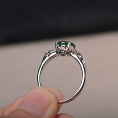 This is a gorgeous handmade creation, a combination of beauty, simplicity & Elegance. The 7*7mm round cut lab emerald is crafted in solid sterling silver and with rhodium plated. 14K white gold/rose gold/yellow gold available as well,pls contact me if you need. All item is sent in a beautiful gift box You can realize more lovely stuff clicking the link https://www.etsy.com/shop/knightjewelry?refshopsection_shophome_leftnav Please leave the correct address and you phone number for delivering Timeless Emerald Ring With Accent Stones For Promise, Wedding Emerald Ring In 14k White Gold, Classic Round Emerald Promise Ring, Dainty Emerald Open Ring For Wedding, Timeless Emerald Wedding Ring For May Birthstone, Elegant Bezel-set Emerald Ring For May Birthstone, Elegant Emerald Ring With Bezel Setting, Exquisite Emerald Cut Ring For Promise, 14k White Gold Emerald-cut Emerald Ring For Wedding