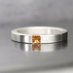 Modern Princess Cut Orange Sapphire Wedding Band Women's Silver Ring Bridal Minimalistic Crisp Squar Modern Princess Cut Promise Jewelry, Modern Emerald-cut Stackable Rings For Anniversary, Modern Jewelry With Princess Cut Polished Finish, Modern Solitaire Princess Cut Wedding Ring, Modern Diamond Jewelry With Simple Design, Modern Simple Diamond Jewelry, Modern Jewelry With Princess Cut Diamond, Modern Emerald Cut Stackable Promise Rings, Wedding Jewelry With Polished Square Cut