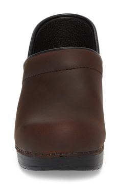 A lightweight, fan-favorite clog with a roomy fit offers long-wearing support thanks to a memory foam footbed and a slip-resistant outsole. Style Name:Dansko Wide Pro Clog (Women). Style Number: 5600183. Available in stores. Classic Brown Synthetic Clogs, Functional Slip-resistant Closed Toe Clogs, Classic Slip-resistant Clogs With Round Toe, Comfortable Slip-resistant Clogs With Round Toe, Slip-resistant Round Toe Comfortable Clogs, Brown Synthetic Clogs With Arch Support, Slip-resistant Synthetic Clogs With Round Toe, Slip-resistant Closed Toe Clogs, Brown Synthetic Clogs With Rubber Sole