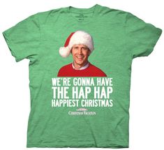 a green t - shirt with an image of a man wearing a santa claus hat