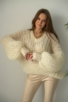 Cozy V-neck Knitted Sweater, Cozy V-neck Sweater, Cozy Chunky Knit Long Sleeve V-neck Sweater, Cozy Cream V-neck Sweater For Winter, Hand Knitted V-neck Sweater For Fall, Cozy Soft Knit Acrylic Sweater, Cozy Acrylic Soft Knit Sweater, Cozy Open Knit Cropped Sweater For Fall, Cozy Open Knit Sweater