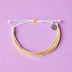 It’s the bracelet that started it all. Each one is handmade, waterproof and totally unique— in fact, the more you wear it, the cooler it looks. Grab yours today to feel the Pura Vida vibes. Casual White Braided Bracelets For Everyday, Casual Handmade Bracelets For Everyday, Bohemian Yellow Bracelets For Everyday Wear, Trendy Summer Friendship Braided Bracelets, Minimalist Friendship Bracelets For Summer, Summer Minimalist Friendship Bracelets, Minimalist Summer Friendship Bracelets, White Minimalist Friendship Bracelets For Summer, Bohemian Yellow Friendship Bracelets