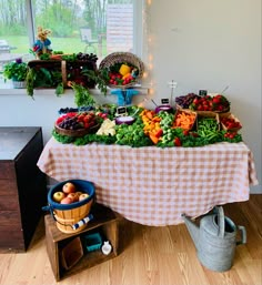 Lots of colorful veggies and fruit. Dip in carved cabbage. Little things about Peter Rabbit sitting around. Peter Rabbit Charcuterie Board, Mr Mcgregor Garden, Bunny Garden Party, Peter The Rabbit Baby Shower Theme, Peter Rabbit Party Food, Mr Mcgregors Garden, Peter Rabbit Baby Shower Ideas, Farmers Market Birthday Party, Peter Rabbit Birthday Party