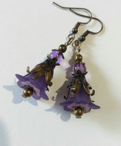 Purple Victorian bronze flower earrings lavender flower set necklace earrings Purple flower earrings Boho bronze earrings gift Gorgeous Victorian style jewelry set necklace and earrings . Bohemian necklace and earrings . Beautiful Set of bronze-tone Antique style lavender purple plastic flowers  and beautiful ornamented caps necklace and earrings. Bronze Victorian style necklace and earrings. Boho necklace. Bohemian necklace and earrings. Romantic necklace and earrings. Royal style jewelry set. Purple Wire Wrapped Czech Glass Jewelry, Purple Brass Earrings As Gift, Handmade Vintage Purple Flower Earrings, Purple Metal Drop Earrings, Bronze Czech Glass Drop Earrings, Gift Jewelry With Flower Charm And Czech Glass, Gift Jewelry With Flower Charm In Czech Glass, Lavender Flower Jewelry For Pierced Ears, Purple Dangle Metal Jewelry