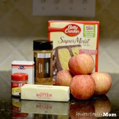 apples, butter, and other ingredients are sitting on a counter